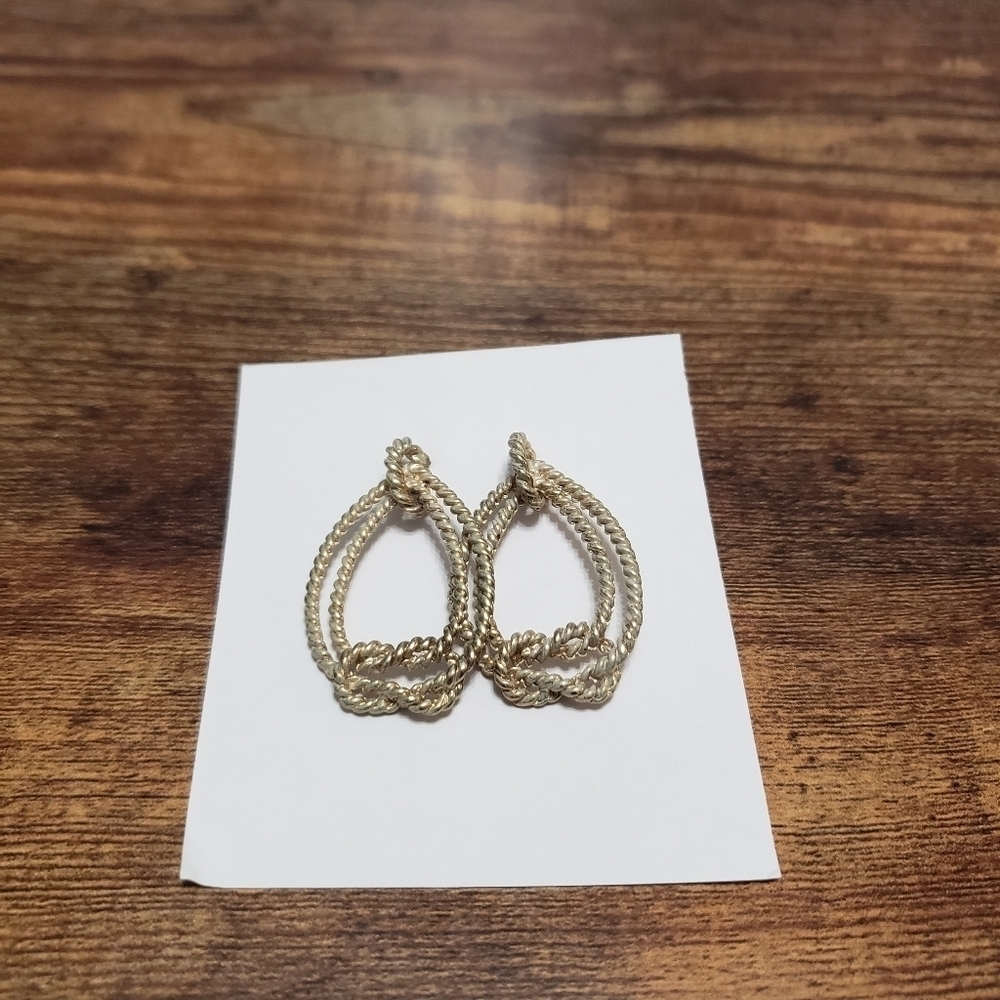 gold tone twist dangling statement earrings